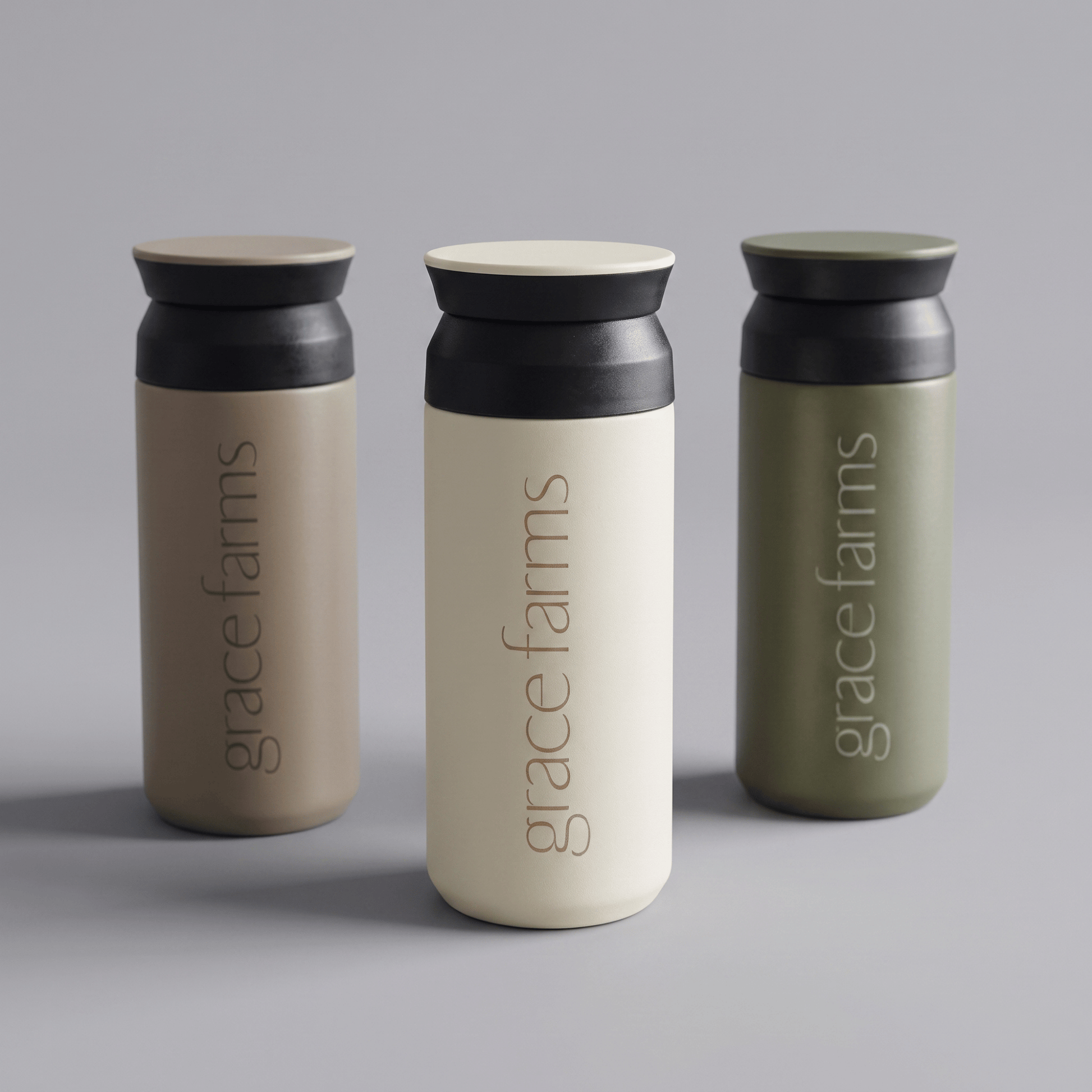 Three Grace Farms edition KINTO travel tumblers on seamless background